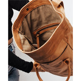 The Tote Backpack